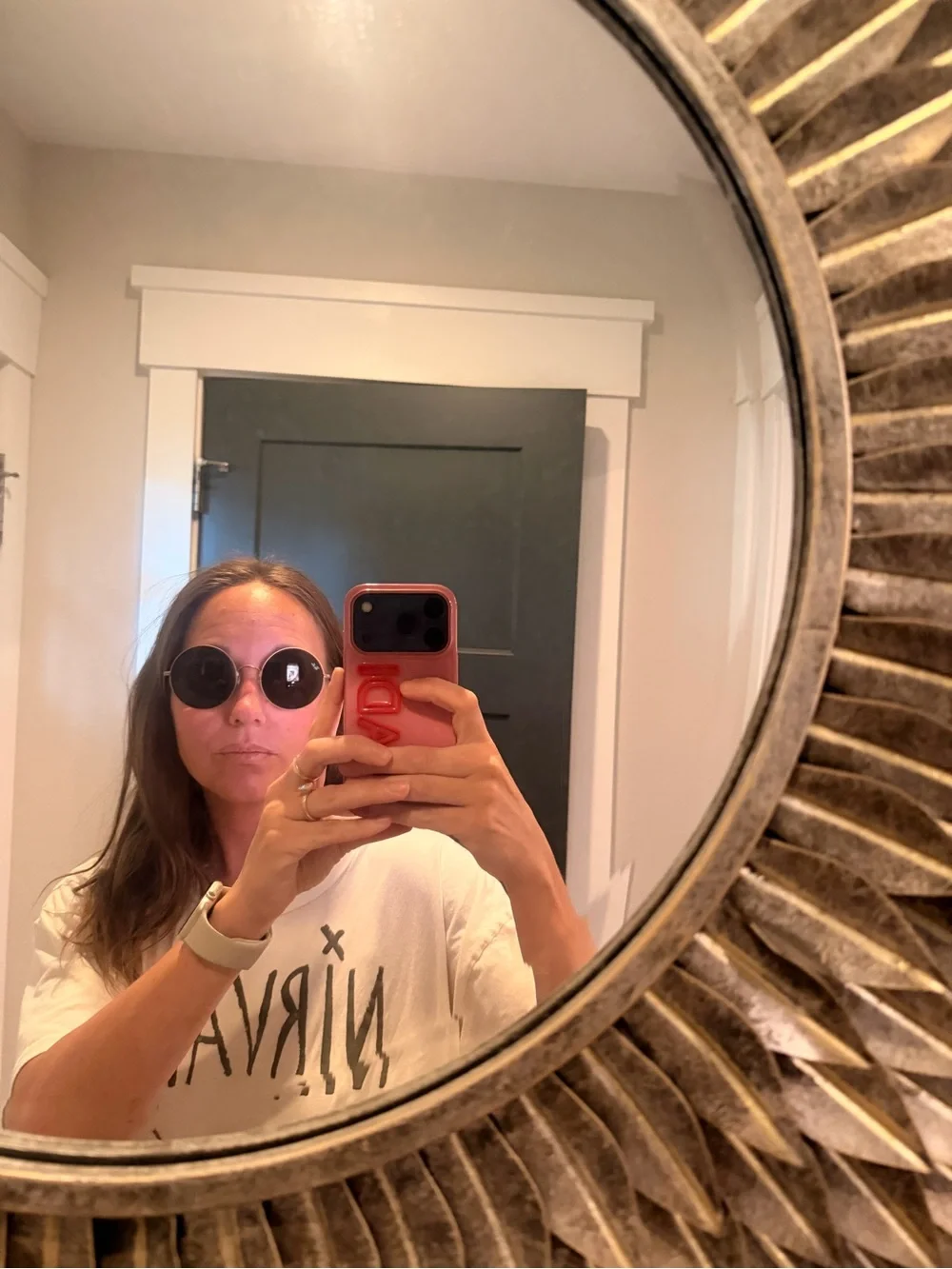 Raybans: Ja-Jo style. Rose gold frame. Black lenses I believe.